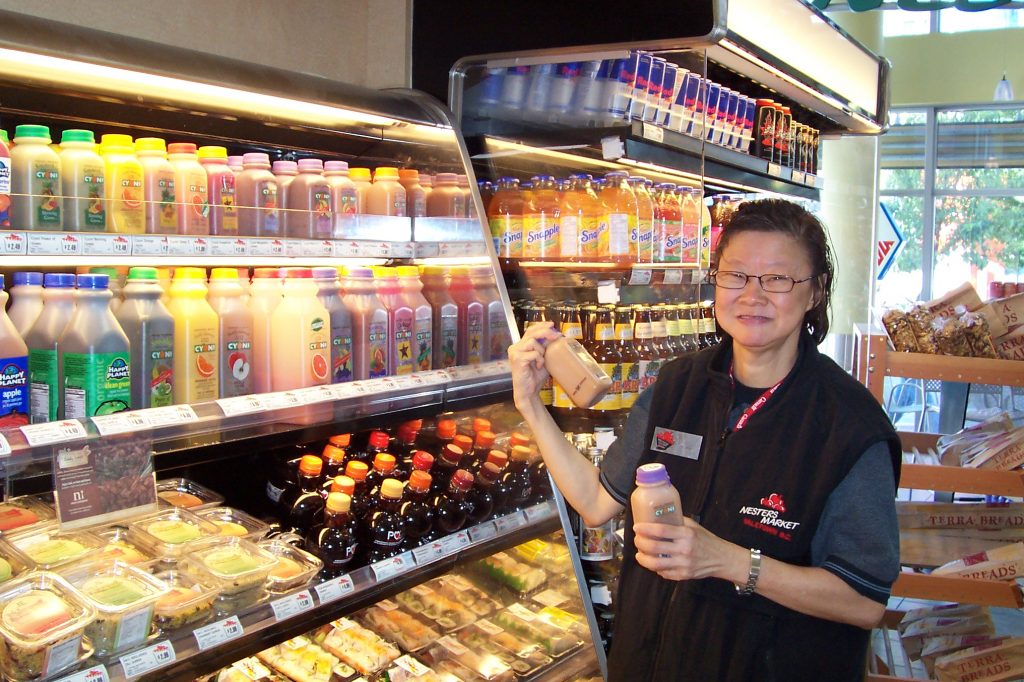 adult with developmental disability working at grocery store